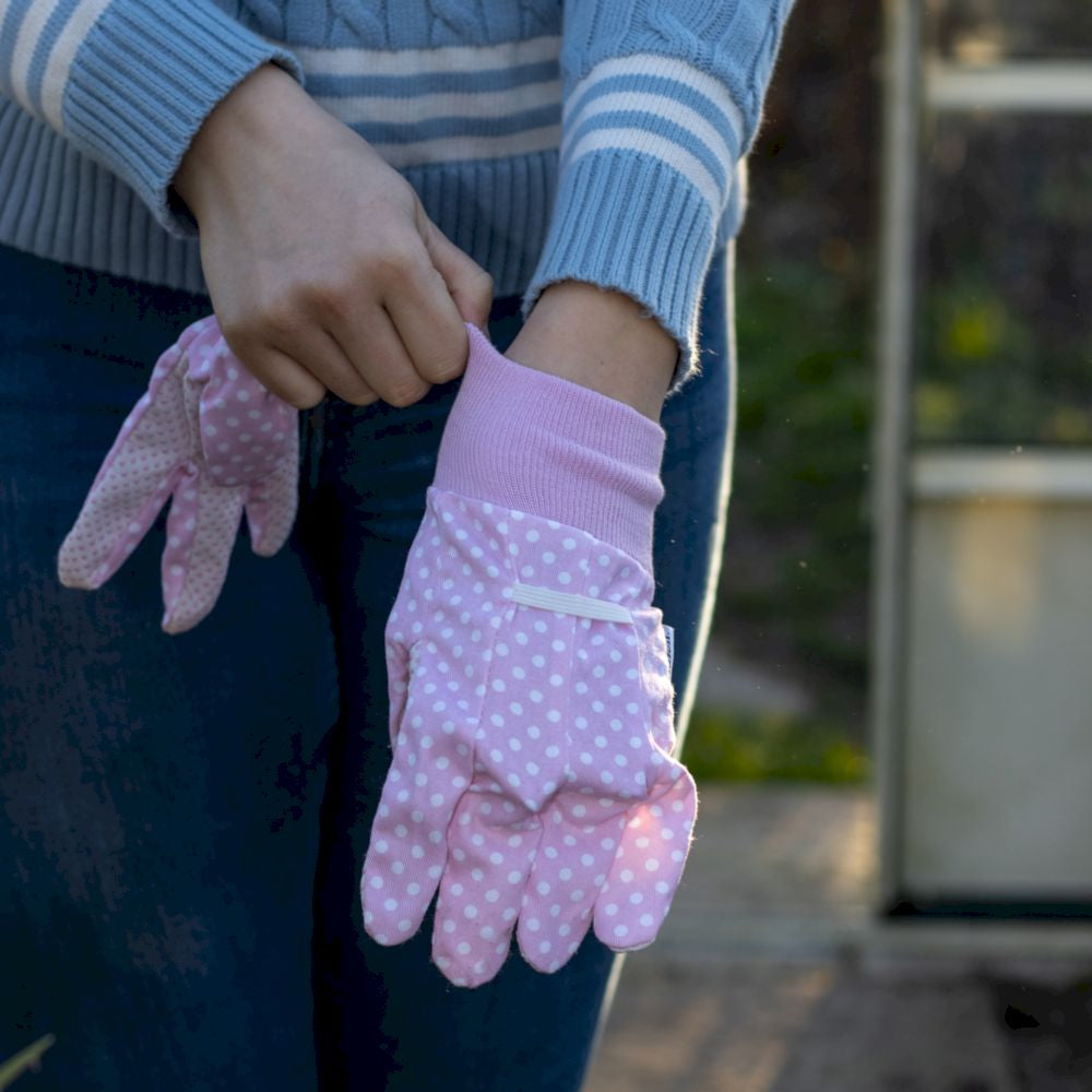 100% Cotton gardening glove in pastel polka dots with PVC dots on the palm for grip